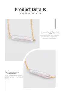 Macro detail of iridescent Baroque pearl and delicate gold plated silver chain