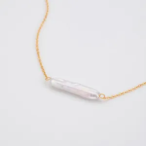 Elegant gold plated necklace with a long bar-shaped baroque pearl minimalist pendant