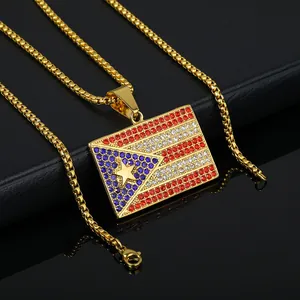 Close-up of gold hip-hop necklace with Puerto Rico flag rhinestone pendant.