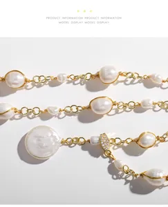 Macro detail view of baroque irregular pearl necklace with gold chain and crystals.