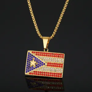 Macro detail of high-quality iced out Puerto Rico flag pendant necklace with colorful rhinestones