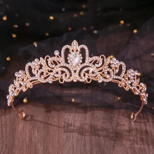Detailed macro shot of a golden bridal tiara with sparkling rhinestones