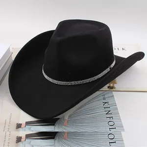 Detailed view of a classic black western cowboy hat with a sparkling rhinestone decorated band