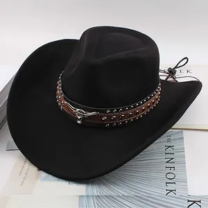 Detailed view of black western cowboy hat with bull head emblem and silver studs