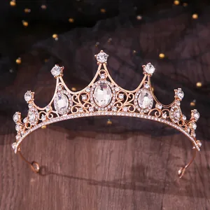 Elegant rose gold bridal tiara with sparkling crystal rhinestones close-up detail