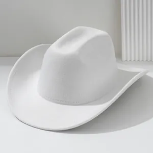 Close-up of a premium white soft felt western cowboy hat with a classic pinched crown.