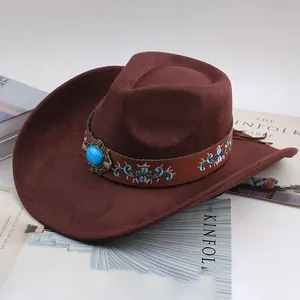 Detail view of brown suede cowboy hat with turquoise bead and floral embroidery