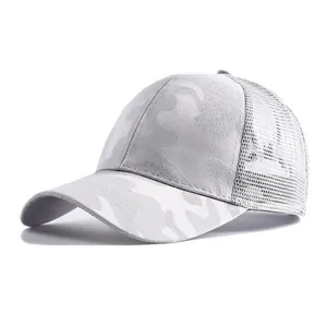 Detail of breathable mesh and camouflage fabric on the quick-dry trucker hat