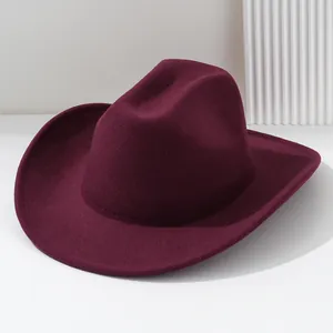 Detailed macro view showing the soft wine red felt texture of this Western cowboy hat
