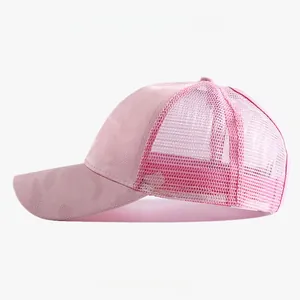 Side view detail of a breathable pink mesh ponytail baseball cap featuring a camouflage pattern