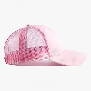 Side view of a pink camouflage mesh trucker hat for women sun protection