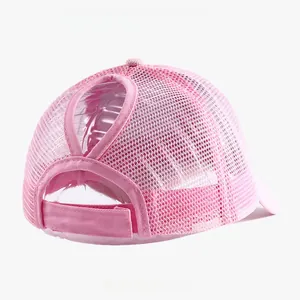 Back detail of pink mesh ponytail baseball cap with functional opening for high buns