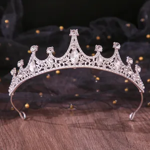 Detailed view of an elegant silver bridal rhinestone tiara for weddings and birthdays.