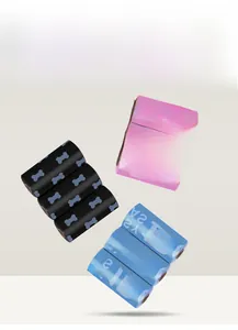High-quality biodegradable pet waste bags shown in black, pink, and blue color rolls
