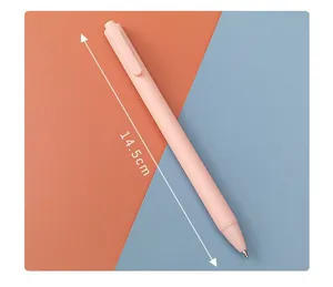 Macro detail view showing the 14.5cm length of a pink Morandi retractable gel pen