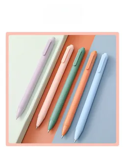 Macro view of macaron colored retractable pens in five pastel shades
