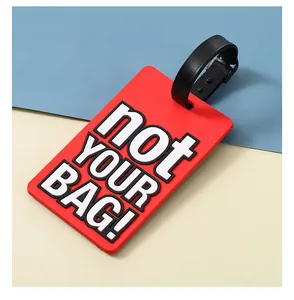 Durable red PVC luggage tag with bold 'not YOUR BAG!' text and black strap for travel