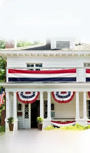 Patriotic US Independence Day bunting and banner set displayed on a white house porch