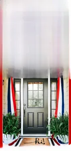 Patriotic red, white and blue banner decoration on a front porch entrance