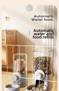 Detailed view of a hanging automatic pet food feeder and water dispenser set for cages.