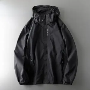 Front view of black waterproof windbreaker jacket for outdoor hiking and techwear style