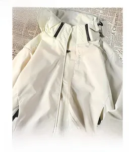 Beige windproof waterproof outdoor mountain jacket with a stylish stand-up collar design