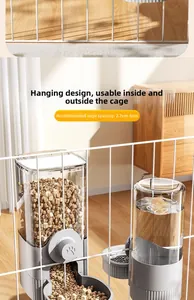 Automatic hanging pet feeder and waterer set mounted on a white wire cage for cats