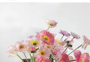 Detailed close-up view of elegant pink and orange artificial Icelandic poppy flowers