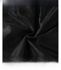 Detail shot of the breathable honeycomb mesh lining for windproof outdoor jackets