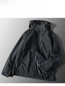 Detailed flat-lay of a black waterproof outdoor windbreaker jacket with a hood