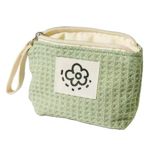 Mint green waffle fabric mini coin purse with cute flower patch for small essentials