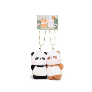 Adorable pair of magnetic plush keychains featuring cute panda and kitten characters