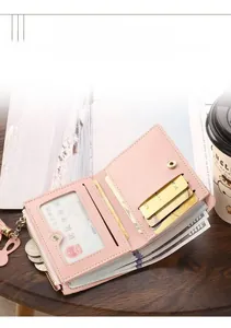 Compact pink bi-fold wallet with multiple card slots and secure zipper coin pocket