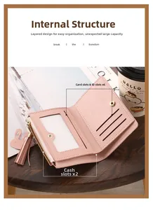 Detail view showing 6 card slots and 2 cash compartments of the pink bifold wallet.