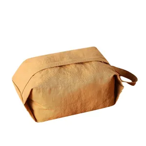 Neceser de viaje grande de tela lavada color amarillo mostaza con asa lateral