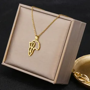Gold Africa map pendant necklace with Ankh symbol on gift box background