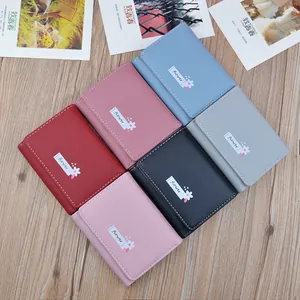Stylish women's short bifold soft leather wallets in various colors and floral detail