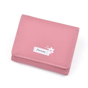 Elegant pink short folding wallet with small white flower pattern for women