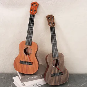 Vue détaillée de deux ukulélés jouets avec un grain de bois réaliste pour enfants