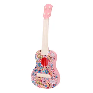 Pink kids toy ukulele with musical patterns for early childhood musical education