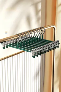 High-quality dark green non-slip trousers rack with stainless steel clips.