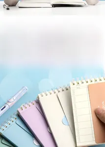 Close-up of Morandi color spiral-bound vocabulary notebook showing page layout