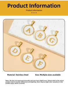 Detail view of various stainless steel alphabet pendants with white inlay design