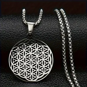 Close-up detail of stainless steel Flower of Life pendant necklace on black texture