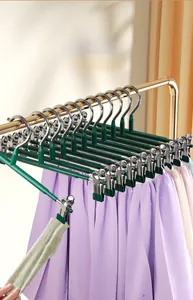 Close-up of non-slip stainless steel pants hangers with strong grip clips