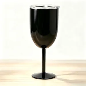 Close-up detail of a sleek black insulated stainless steel wine goblet with a lid