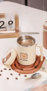 Close-up of 304 stainless steel coffee mug with cute bear and spoon