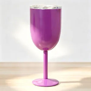Close-up of a purple stainless steel insulated wine goblet with lid on a wood table
