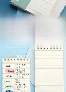 Detail view of a portable vocabulary notebook showing its structured inner pages layout