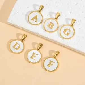 Set of six minimalist gold and white stainless steel initial pendants from A to F